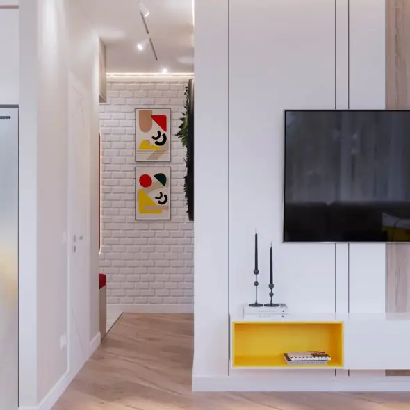 уютное убранство кухни-гостиной с яркими желтыми сегментами интерьера